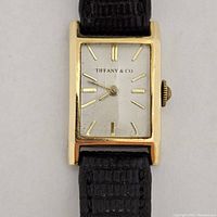 Front view of watch face showing Tiffany & Co. dial and baton markers