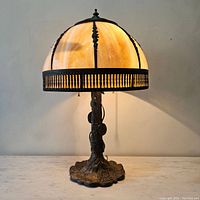 Full view of lamp illuminated on marble surface