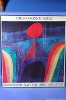 Front view of framed poster displaying colorful abstract artwork with text identifying the Brooklyn Museum and exhibition.