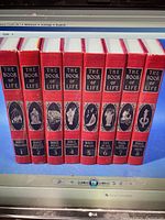 Photo showing all 8 volumes of 'The Book of Life' series with titles and spine artwork visible.