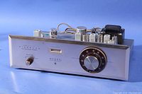 Front view of silver aluminum faceplate showing Scott Stereomaster logo, selector knob, tuning meter window and large tuning dial