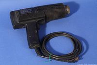 Black & Decker Heat'n Strip electric paint remover heat tool, front and side view showing overall condition and attached power cord.