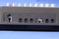 Rear panel showing USB port, send/return jacks, line output RCA jacks, and stereo mix output jacks for TASCAM DP-01FX.
