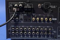 Rear panel connectors showing audio and video RCA input/output ports including phono, CD, tape 1, tape 2, VCR, and Compu Link synchronization port.