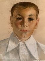 Close frontal view of the boy's face showing detailed pastel work on facial features and white shirt collar.