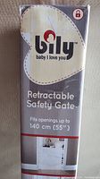 Box front showing Billy brand and retractable safety gate details, including dimensions and feature claims.