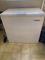 Front view of white Beaumark chest freezer showing size and exterior condition.