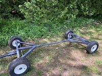 Full overview of adjustable wagon frame on grass