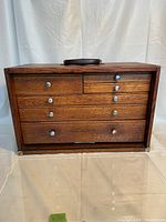 Front view of oak wooden machinist toolbox with six drawers