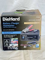 Front view of the DieHard Battery Charger Maintainer box showing product branding, key features, and usage.
