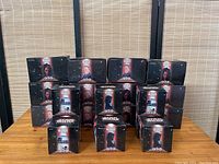 Group of 21 Star Wars Episode 1 Pizza Hut toy boxes arranged in a pyramid shape, showing various characters and vehicles on packaging.