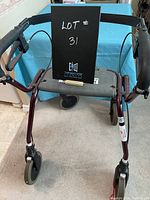 Front view of the Dolomite walker showing the seat and frame structure.