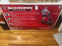 Front of sealed box showing Schwinn 430 Elliptical branding, model, and key features