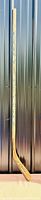 Full length view of the signed Mark Messier wooden hockey stick against metal background.