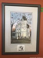 Full view of the framed Walter Campbell print of a Victorian house with Halloween decorations and two figures at the fence, including a smaller inset print below.