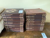 Two stacks of 14 hardcover books each from The Old West book series by Time Life Books, all with brown spines and gold lettering.