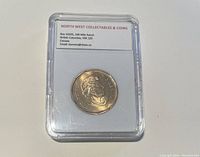 Obverse side of the graded 2010 Canada Saskatchewan one dollar coin showing a figure portrait.