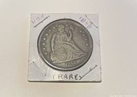 Obverse of the 1848-O Morgan dollar in cardboard 2×2 holder showing date and Liberty design