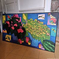 Full view of mounted print leaning against wall showing frame, design and overall condition