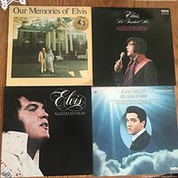 Front view of four Elvis Presley inspirational vinyl LP record albums showing cover art and titles.
