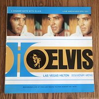 Front cover of the A Dinner Date with Elvis vinyl LP showing the title, Elvis Presley photos, and design elements