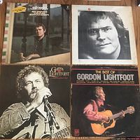 Four Gordon Lightfoot LP vinyls front covers featuring images of Gordon Lightfoot in various poses with guitars and portraits.