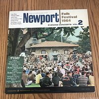 Front cover of the vinyl LP showing the festival crowd and artist names.