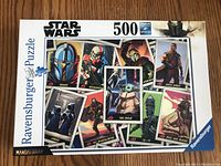 Box front showing Star Wars The Mandalorian themed puzzle with 500 pieces by Ravensburger.