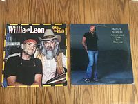 Two vinyl record covers: 'Willie and Leon - One for the Road' 2 record set and 'Willie Nelson - Somewhere Over the Rainbow' single LP.
