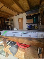 Lithonia LED Track Lighting Kit in boxed packaging showing LED Track Kit branding and lighting fixtures on the box