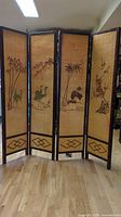 Full view of the four-panel folding screen showing all panels and nature-themed artwork.