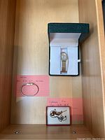 Seiko gold filled top caps watch, Valenza pin and chain with descriptive notes on pink cards