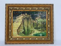 Framed acrylic painting showing the entire artwork and decorative gold frame from the front.