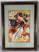 Full view of framed Hua Sanchuan silk embroidery art showing female figure with lion and cloud motifs