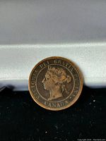 Obverse side showing Queen Victoria profile and inscription.