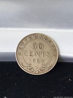 Obverse of 1907 Newfoundland 50 cent coin showing denomination and year dated 1907.