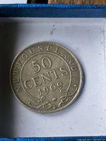 Silver 1909 Newfoundland 50 cents coin showing front with denomination and year 1909