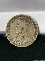 Obverse side showing King George V profile and inscription