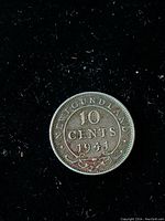 Reverse side of 1941 Newfoundland 10 Cent silver coin showing denomination and year