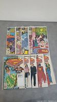 Group shot of all nine comics displays five Man of Steel and four World of Krypton issues