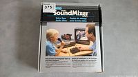 Front of box showing SIMA SoundMixer branding and illustrative use image