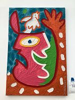 Full view of multicolor abstract painting featuring stylized face, bird and white dots with impasto texture