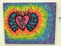 Full frontal view of the canvas painting on a white wall, showing overall design and condition