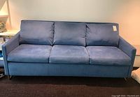 Front view of blue ultrasuede sleeper sofa