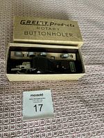 Greist Products rotary buttonholer attachment inside original beige box with two additional parts included