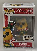 Photo of the new Disney Exclusive Christmas Pluto Funko Pop No. 996 in original Amazon exclusive packaging.