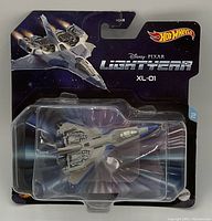 Photo showing the die-cast XL-01 spacecraft from Disney Pixar Lightyear in original Hot Wheels packaging.