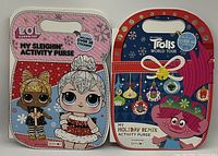 Photo showing the front of two activity purses: LOL Surprise My Sleighin' and Trolls World Tour My Holiday Remix, both new with sticker content noted on packaging.