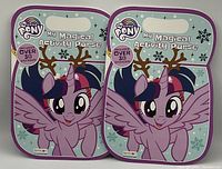 Front view of two unopened My Little Pony My Magical Activity Purses, featuring Twilight Sparkle with reindeer antlers and snowflakes on a pastel blue background.