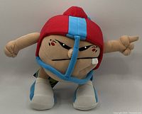 Front view of the NFL plush toy showing detailed face and helmet.